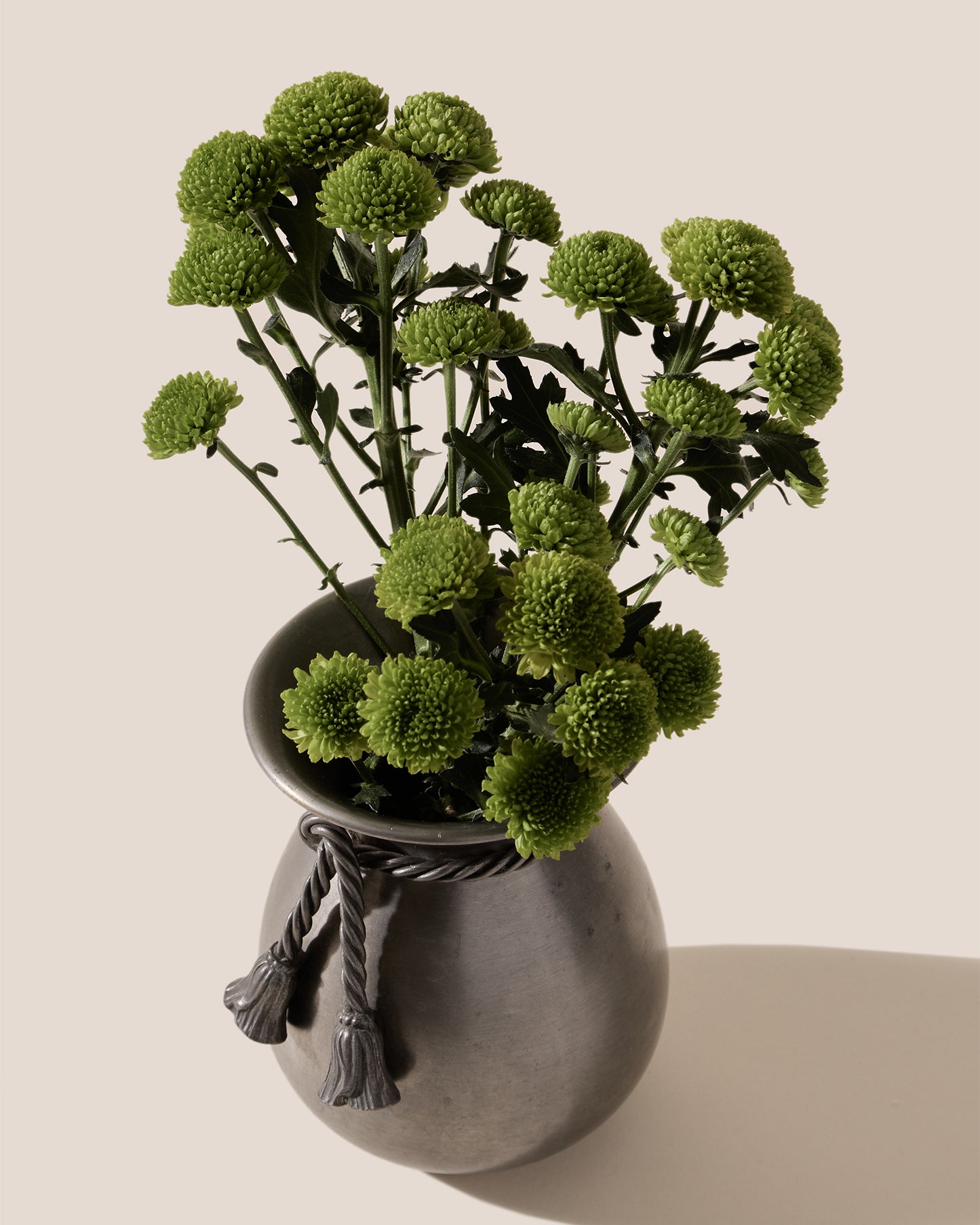 ROUNDED BOW VASE - Metal Vase with Tassel Detail