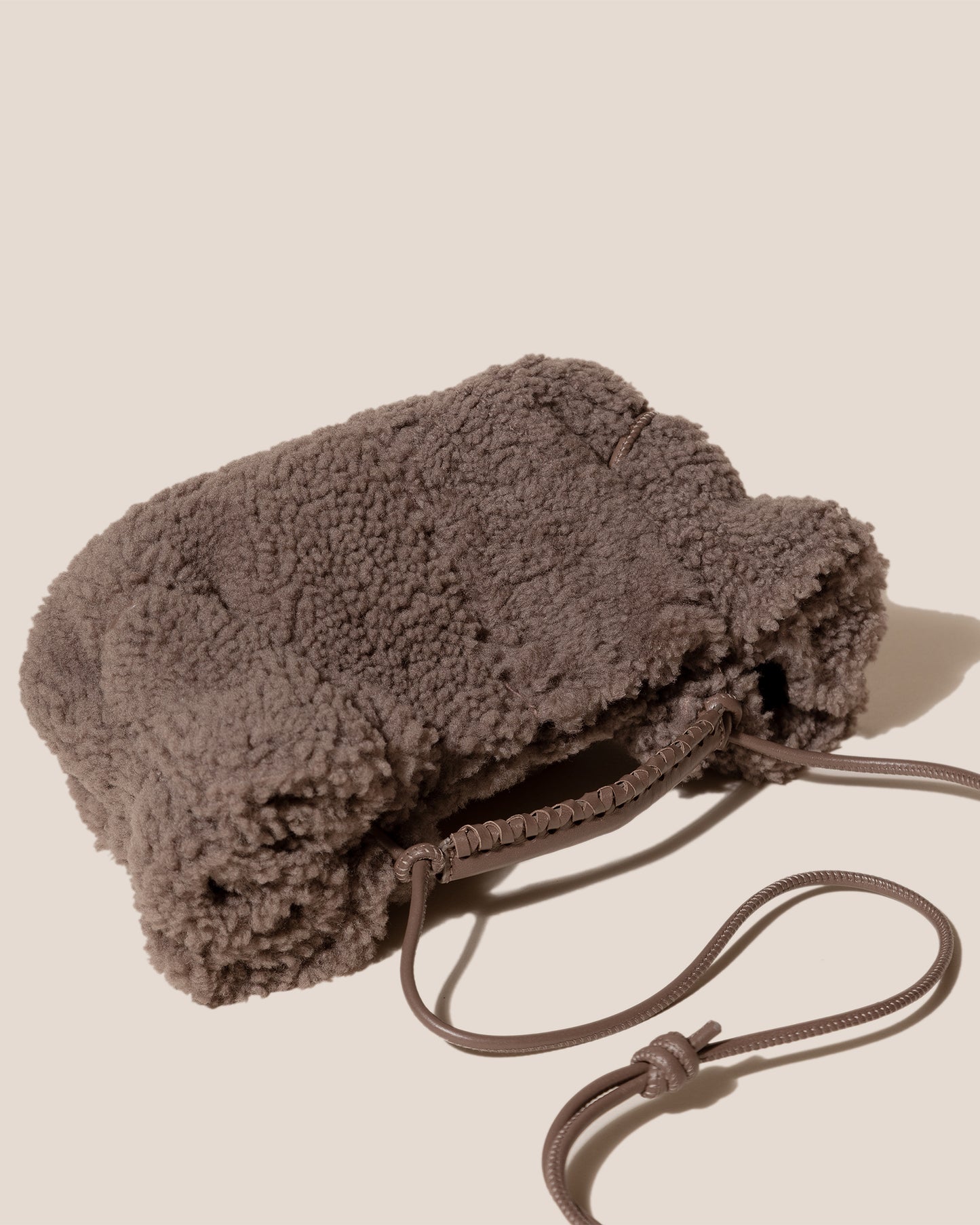 ARTA MINI CURLY SHEARLING - Pleated Crossbody Bag