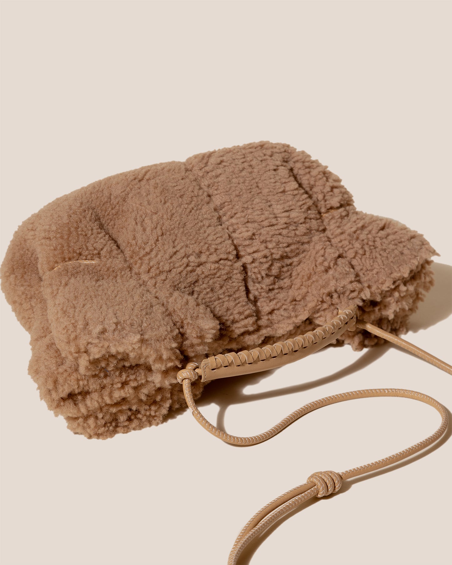 ARTA MINI CURLY SHEARLING - Pleated Crossbody Bag