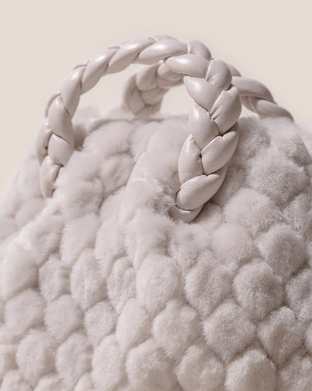 BOMBON QUILTED SHEARLING - Plaited-handle Leather Handbag