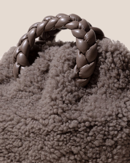 BOMBON CURLY SHEARLING - Plaited-handle Leather Handbag