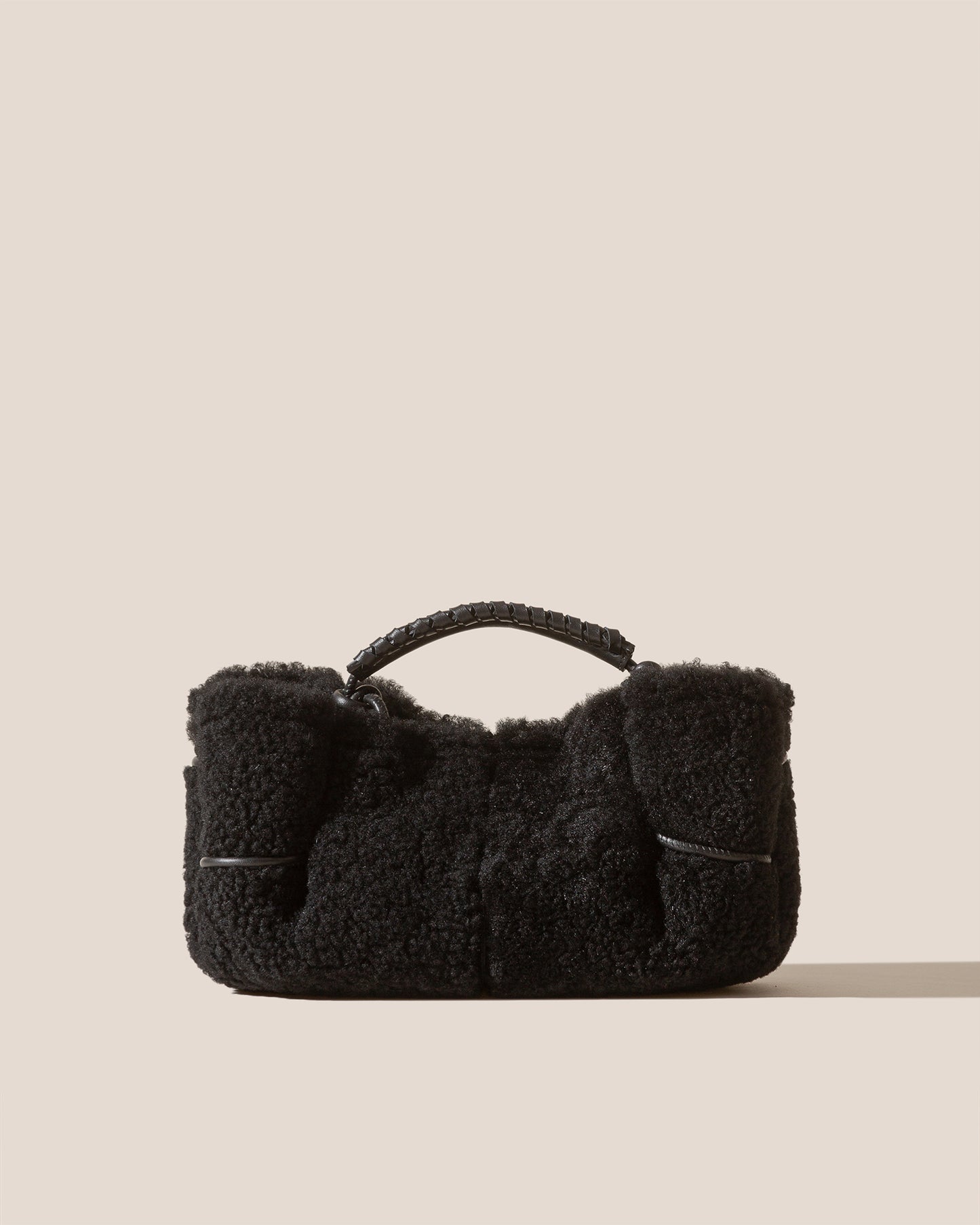 ARTA MINI CURLY SHEARLING - Pleated Crossbody Bag