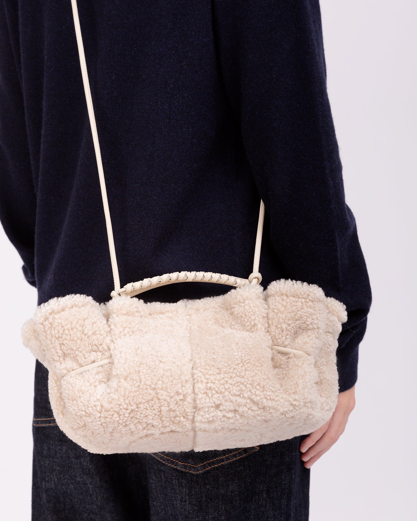 ARTA MINI CURLY SHEARLING - Pleated Crossbody Bag