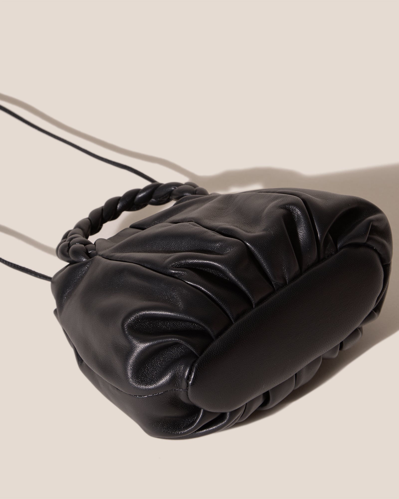 BOMBON BOW - Plaited-handle Leather Handbag