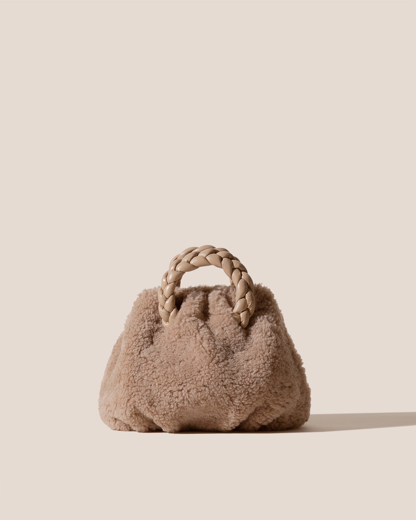 BOMBON CURLY SHEARLING - Plaited-handle Leather Handbag