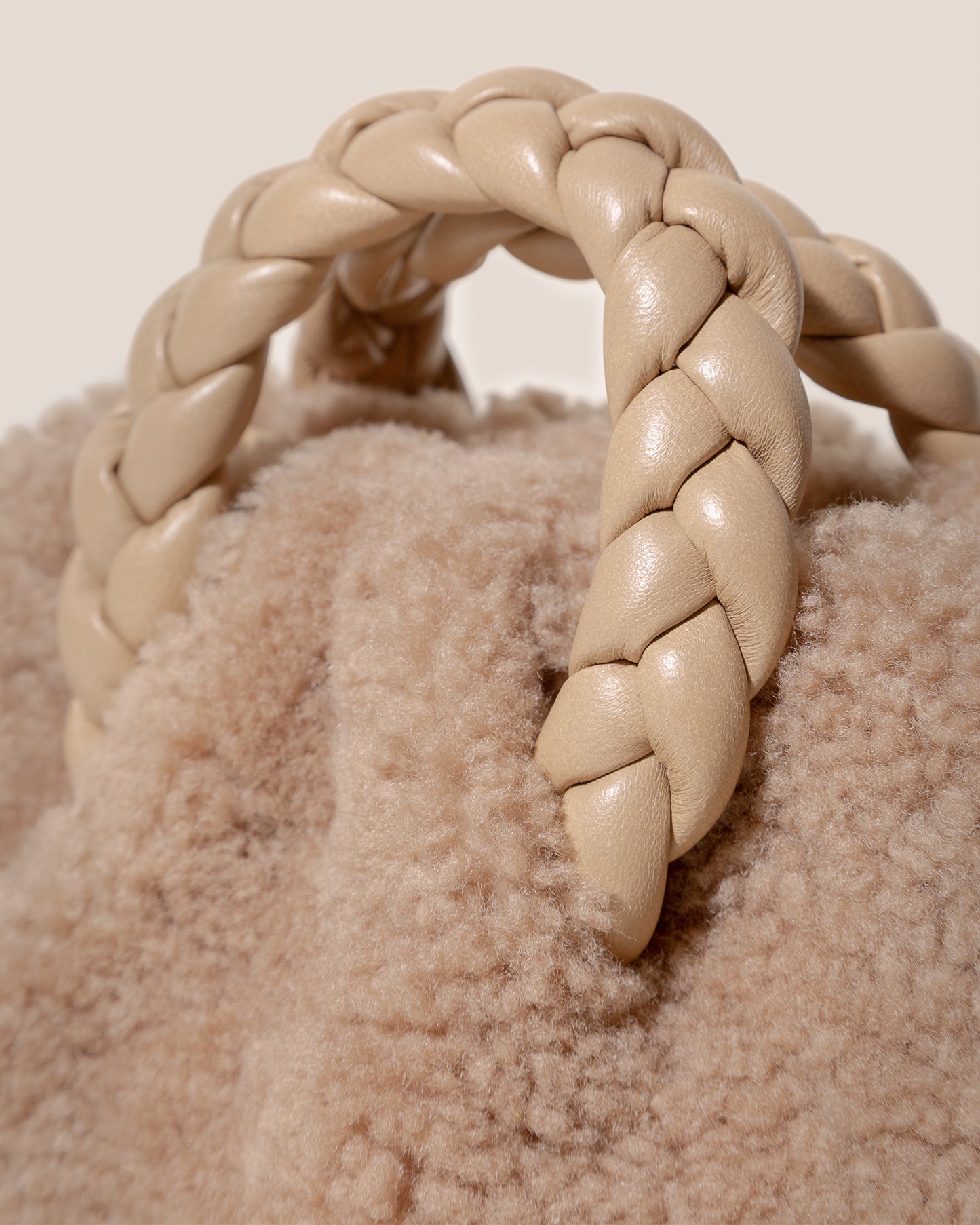 BOMBON CURLY SHEARLING - Plaited-handle Leather Handbag