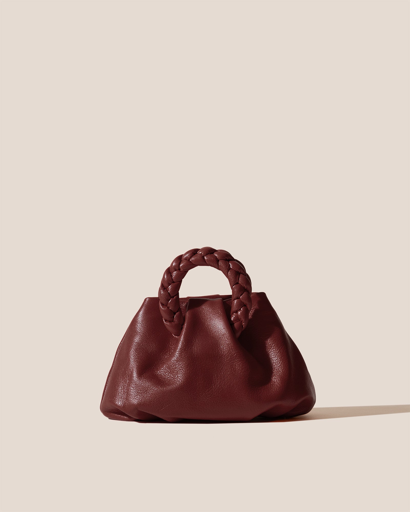 BOMBON SUPPLE SHINY - Plaited-handle Leather Handbag