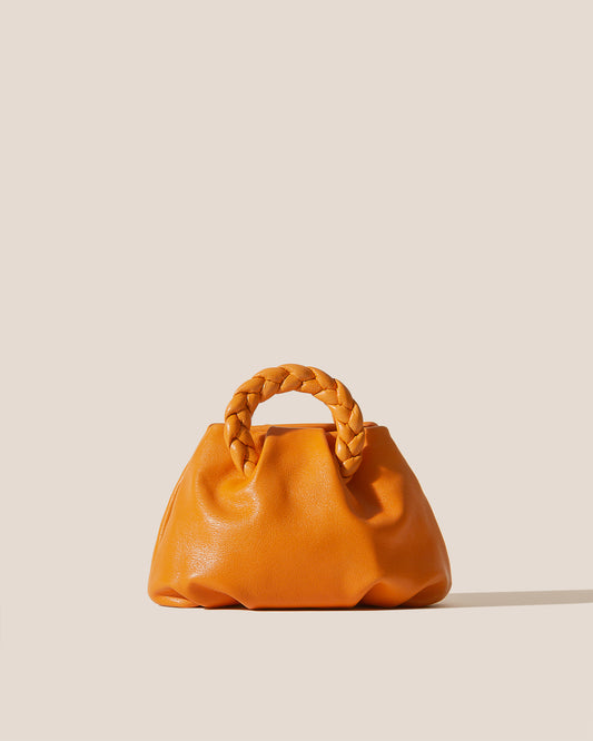 BOMBON SUPPLE SHINY - Plaited-handle Leather Handbag