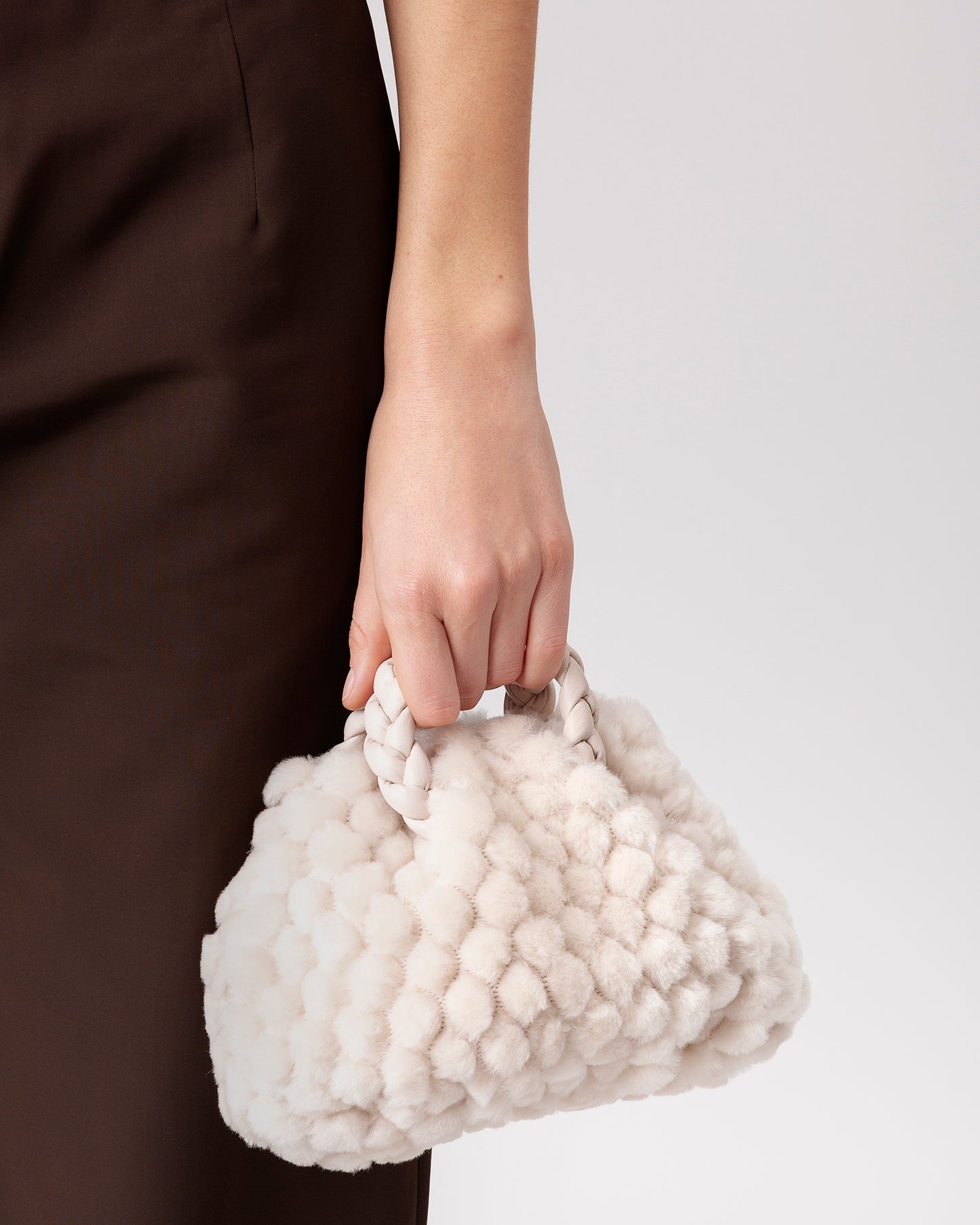 BOMBON QUILTED SHEARLING - Plaited-handle Leather Handbag