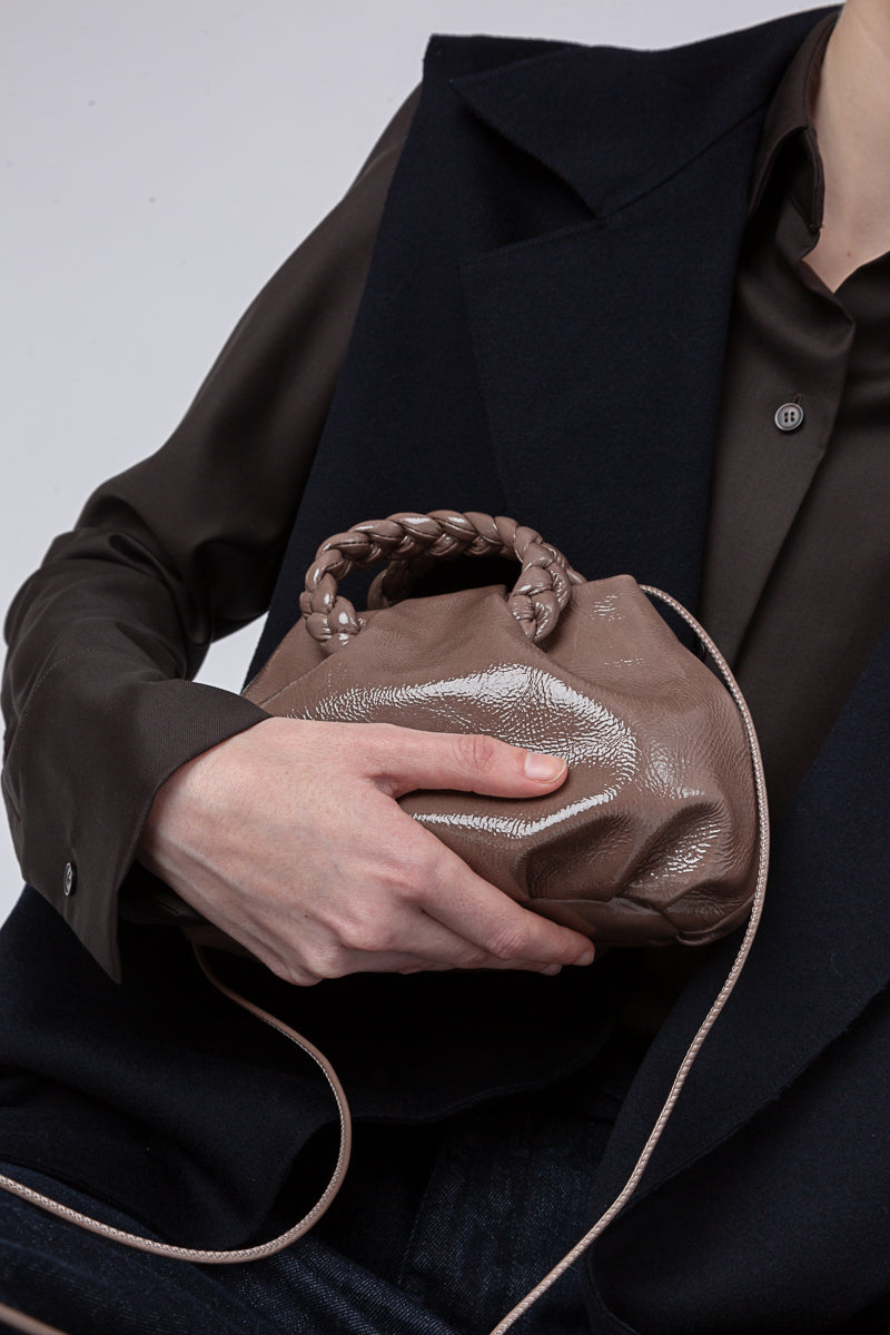 BOMBON CRINKLED GLOSSY - Plaited-handle Leather Handbag