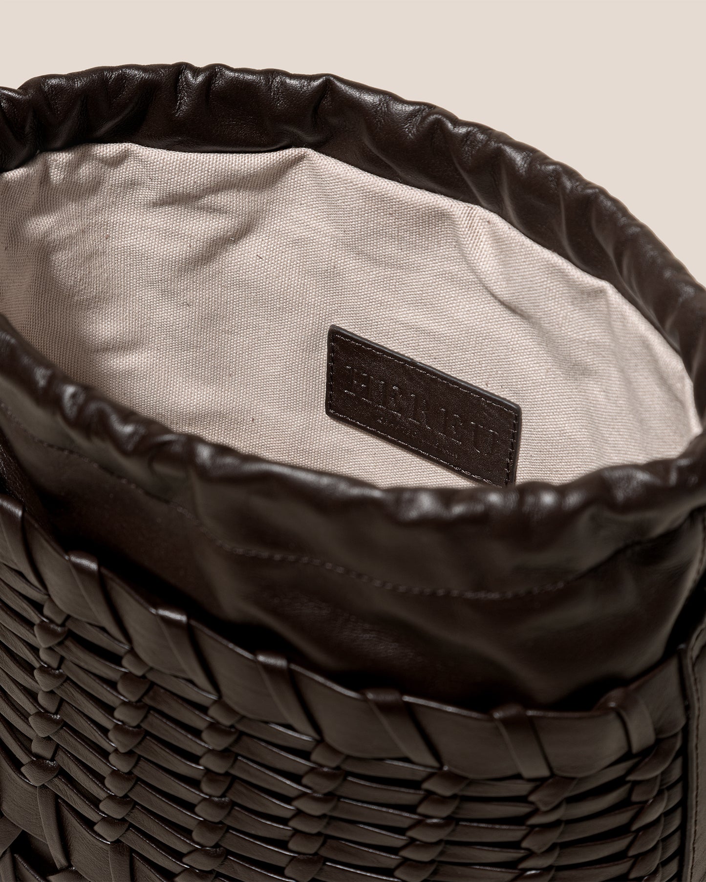 TRENA BUCKET - Interwoven Bucket Crossbody Bag