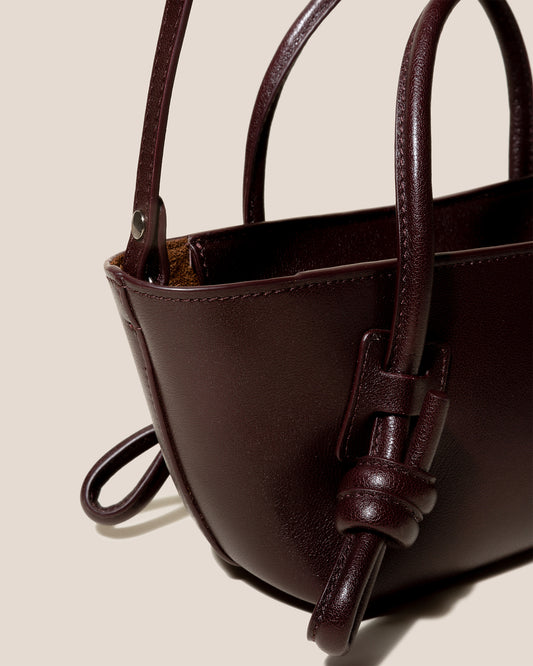 HEREU Sinia Woven Leather Saddle Crossbody Bag