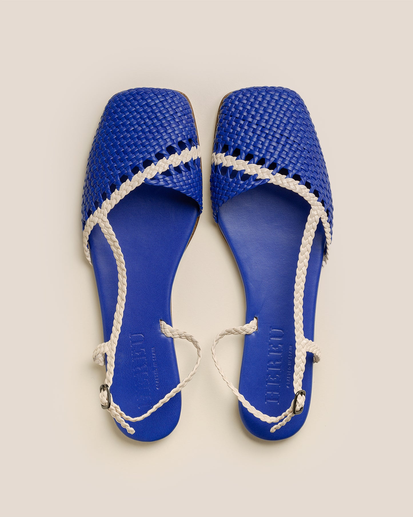 RONDAIA - Woven Asymmetrical Sandal