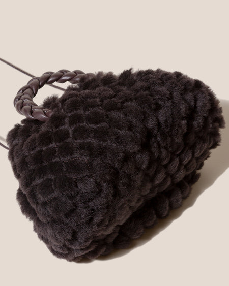 BOMBON QUILTED SHEARLING - Plaited-handle Leather Handbag