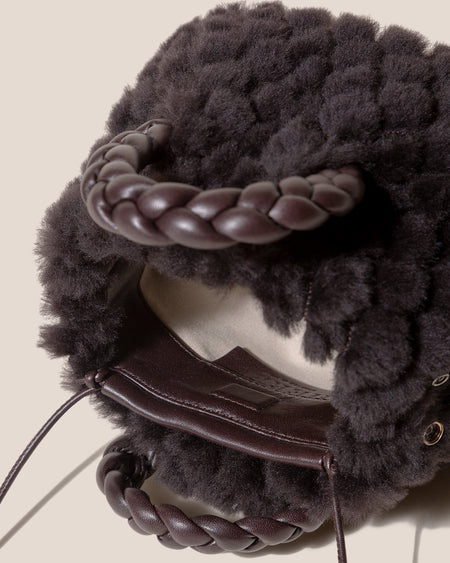 BOMBON QUILTED SHEARLING - Plaited-handle Leather Handbag