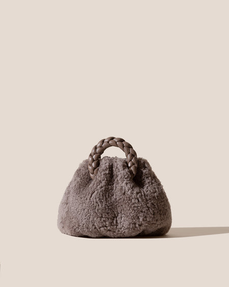 BOMBON CURLY SHEARLING - Plaited-handle Leather Handbag