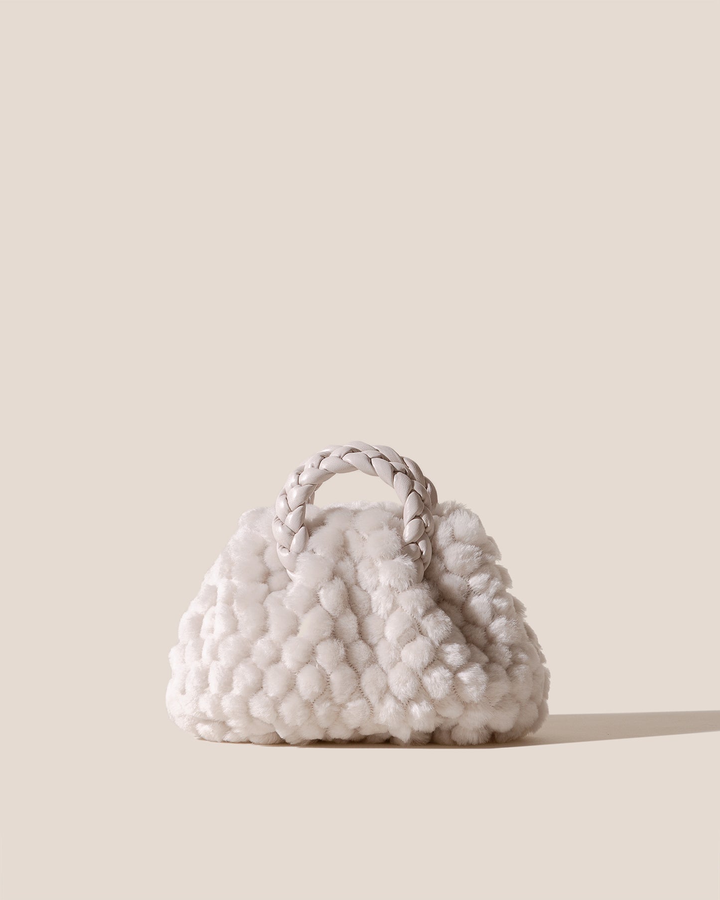 BOMBON QUILTED SHEARLING - Plaited-handle Leather Handbag