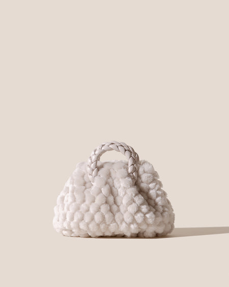 BOMBON QUILTED SHEARLING - Plaited-handle Leather Handbag