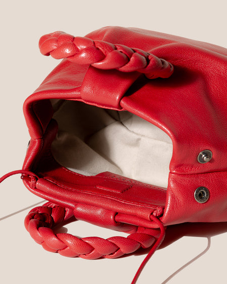 BOMBON SUPPLE SHINY - Plaited-handle Leather Handbag