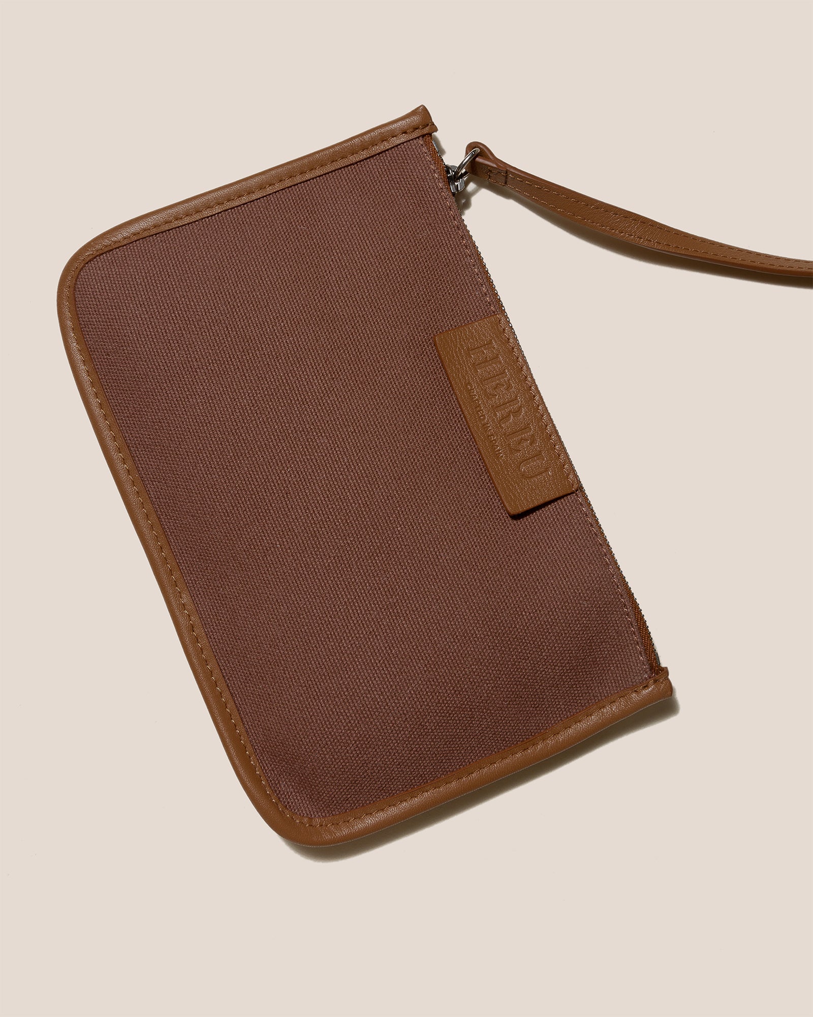 Leather-trimmed pouch