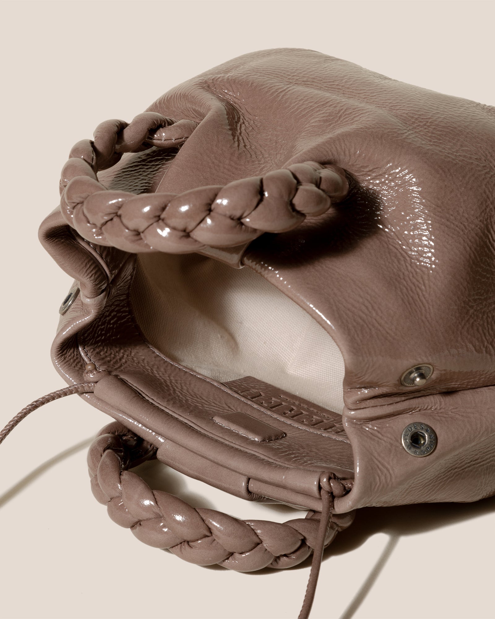 BOMBON M TUMBLED SHINY - Plaited-handle Leather Crossbody Bag – Hereu Studio