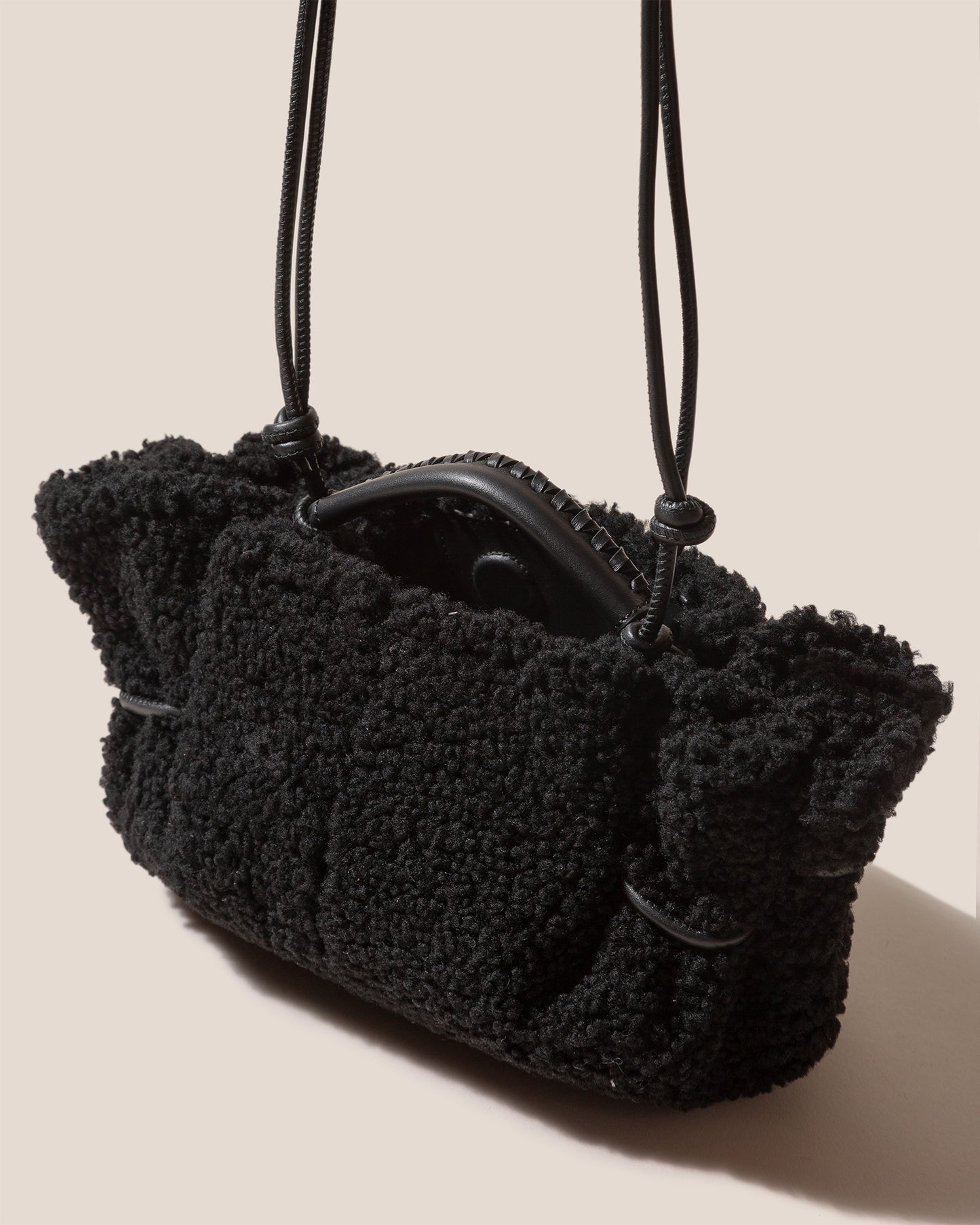 ARTA MINI CURLY SHEARLING - Pleated Crossbody Bag