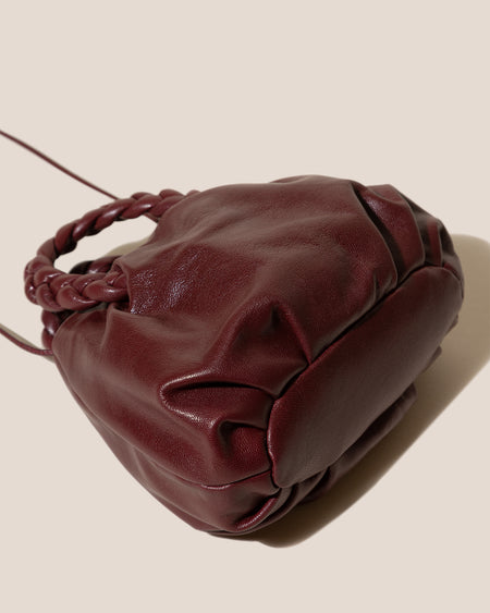BOMBON SUPPLE SHINY - Plaited-handle Leather Handbag