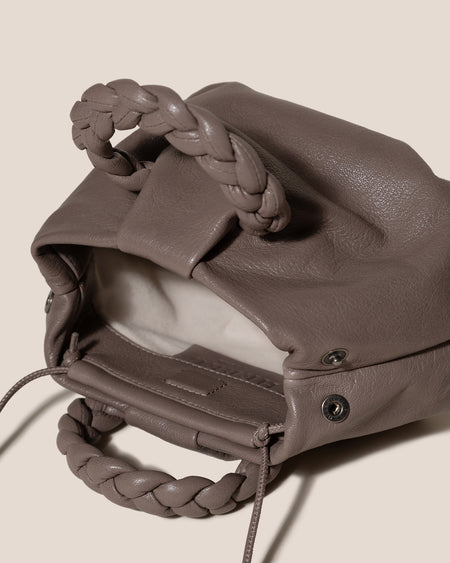 BOMBON SUPPLE SHINY - Plaited-handle Leather Handbag