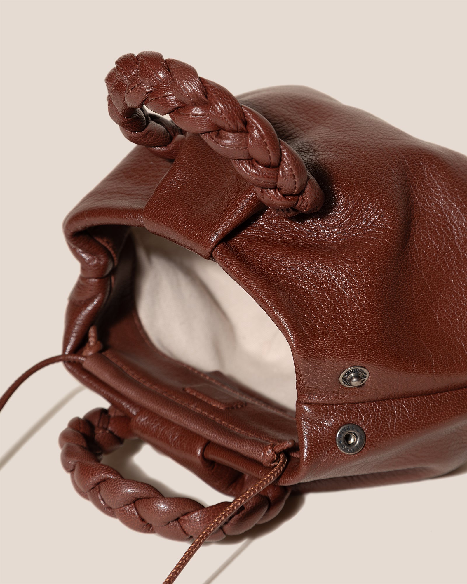 BOMBON SUPPLE SHINY - Plaited-handle Leather Handbag