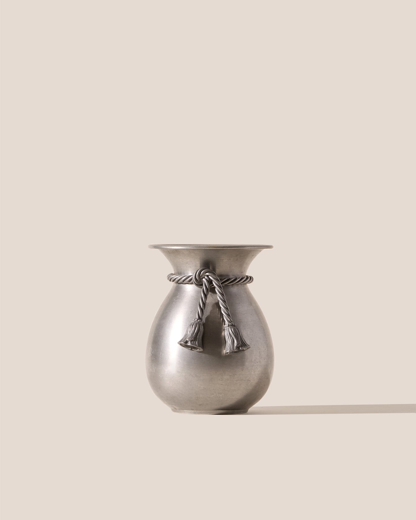 ROUNDED BOW VASE - Metal Vase with Tassel Detail