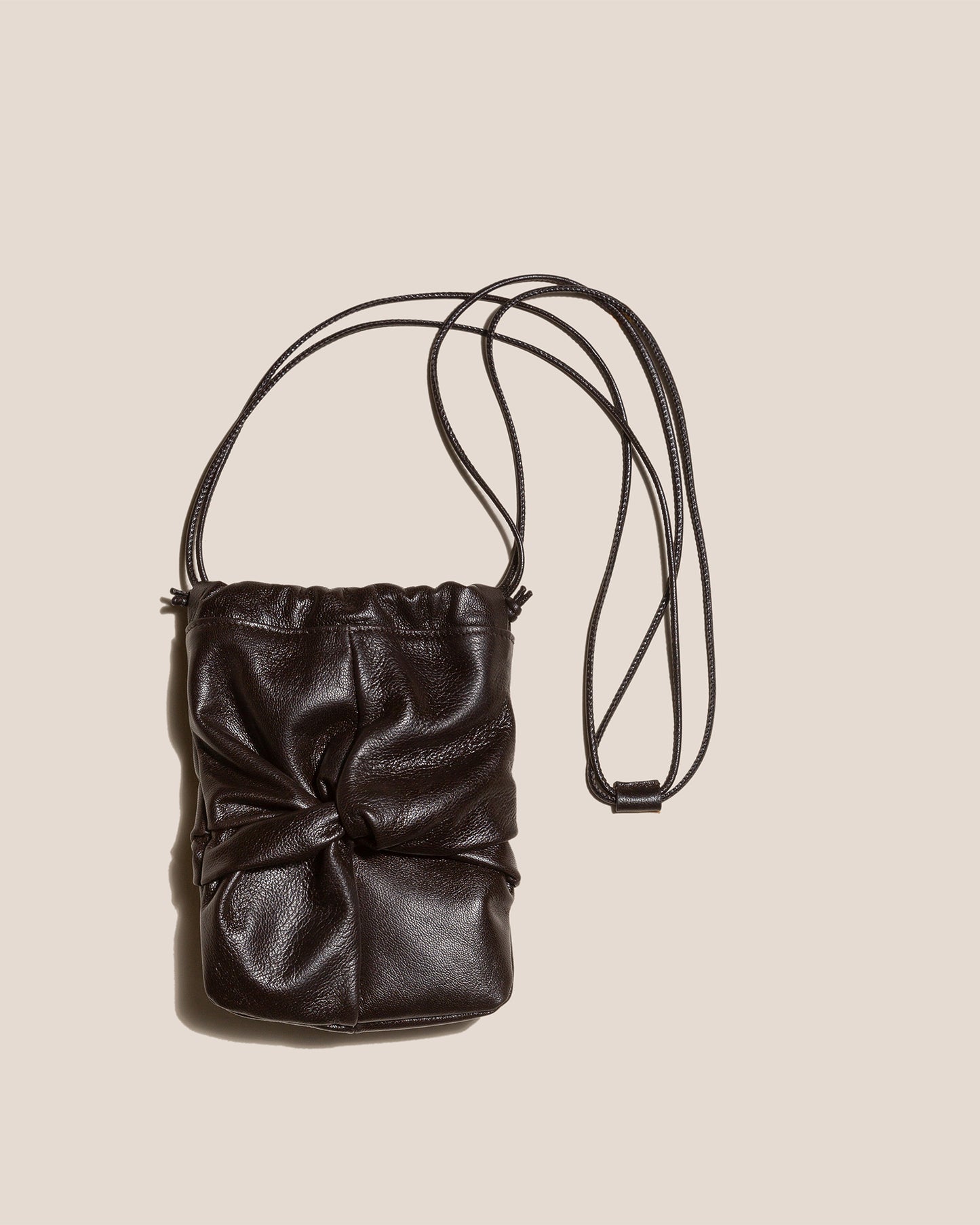 RONET MINI SUPPLE SHINY - Twisted Crossbody Bag