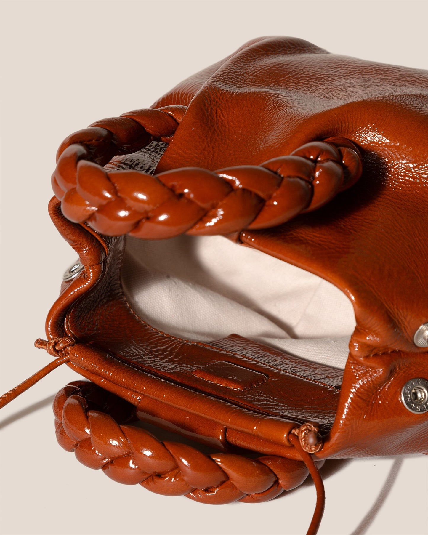 BOMBON CRINKLED GLOSSY - Small Plaited-handle Leather Crossbody Bag