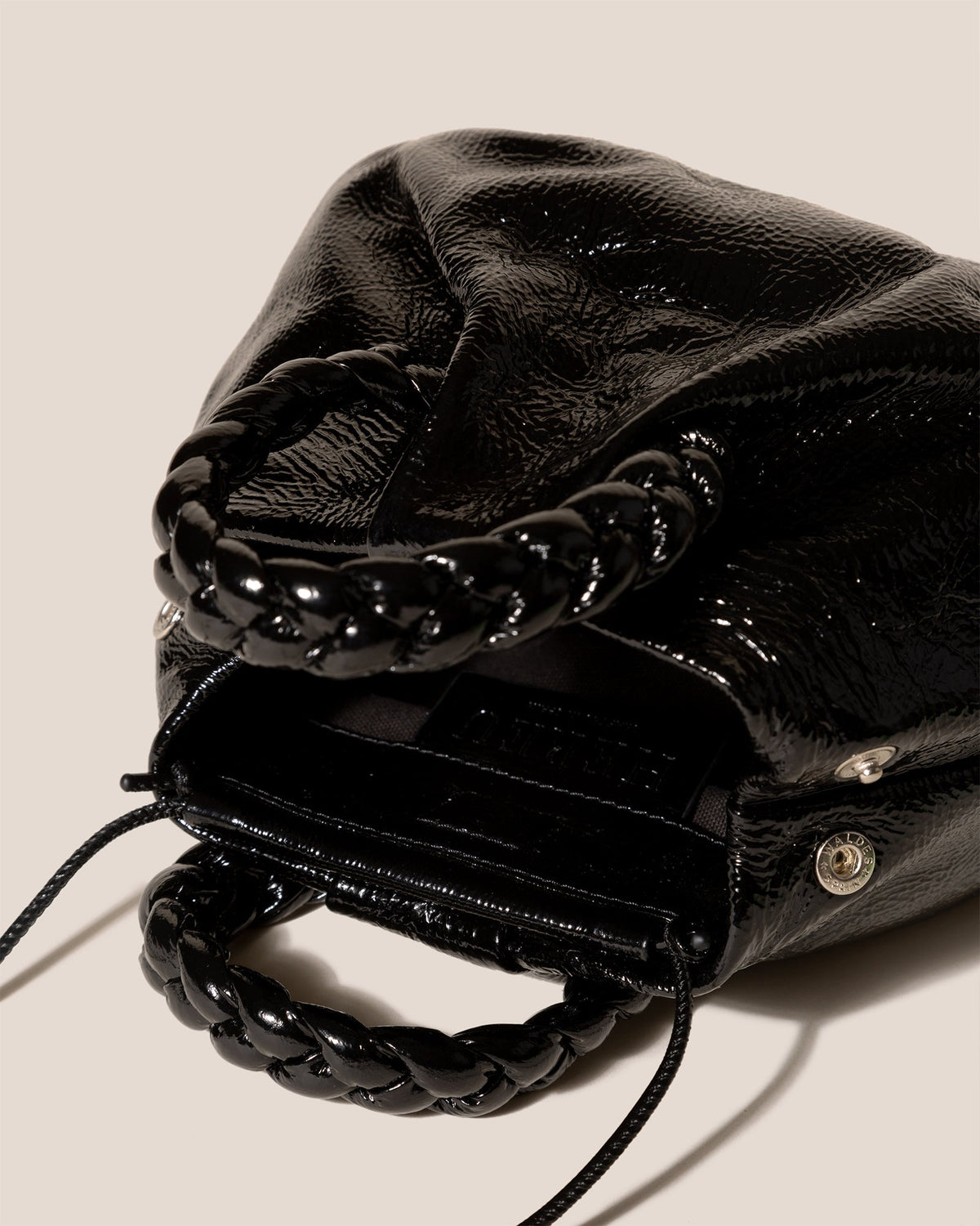 BOMBON CRINKLED GLOSSY - Plaited-handle Leather Handbag