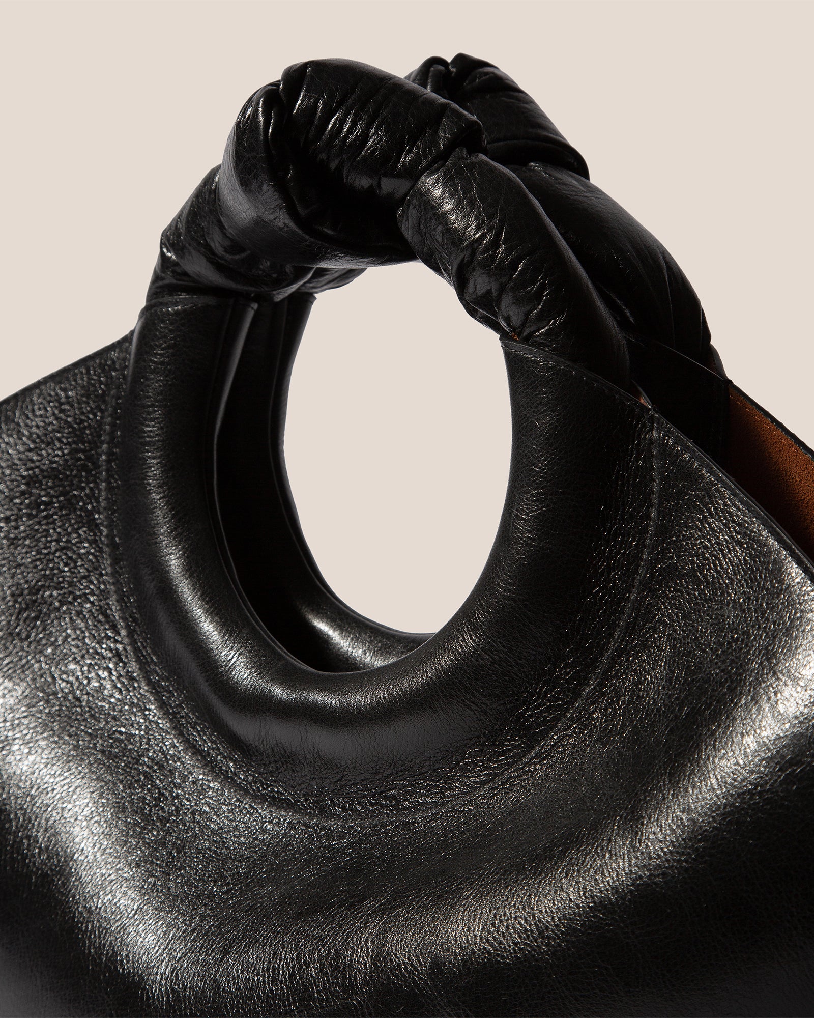 Knotted handle small leather tote clearance bag