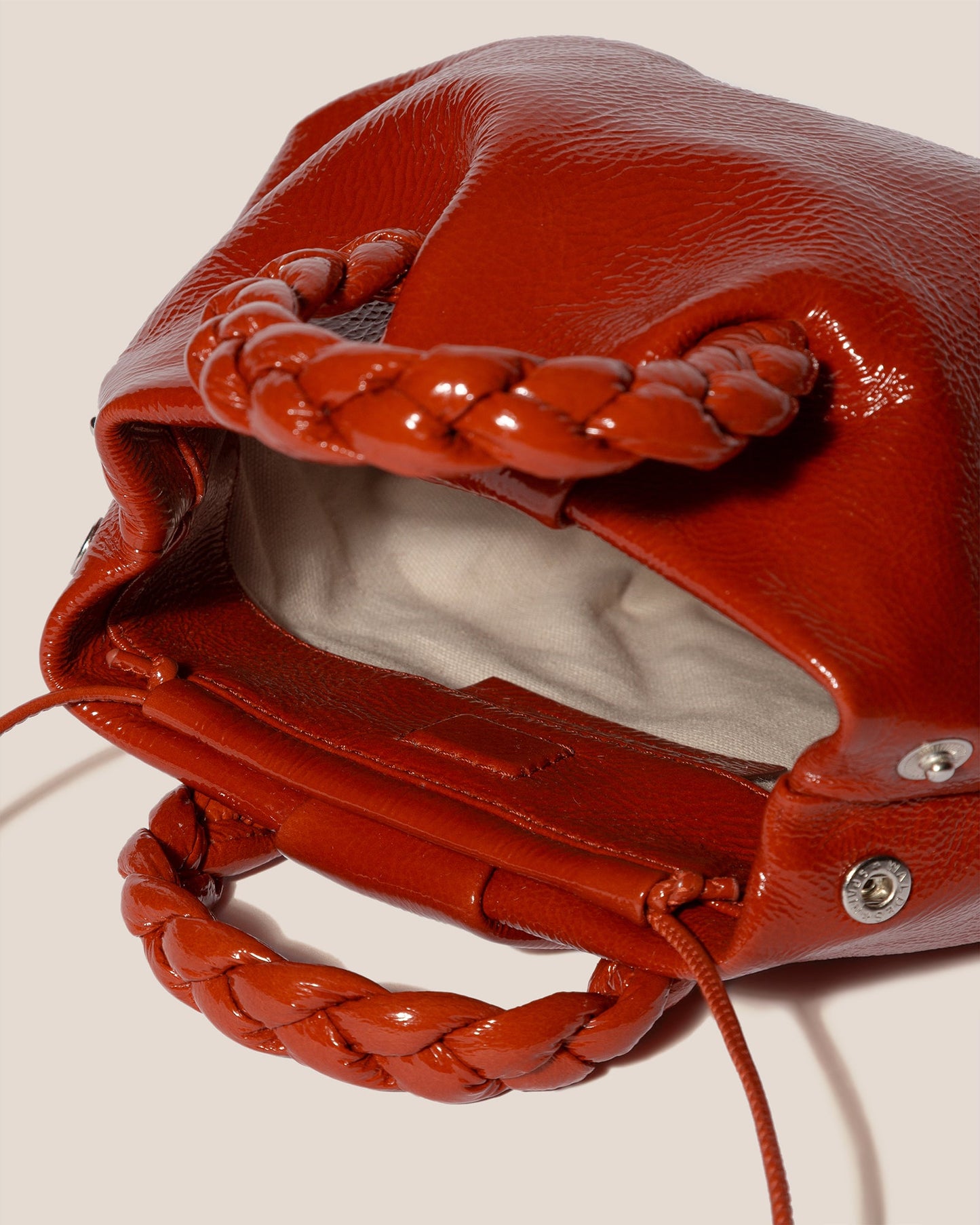 BOMBON CRINKLED GLOSSY - Small Plaited-handle Leather Crossbody Bag